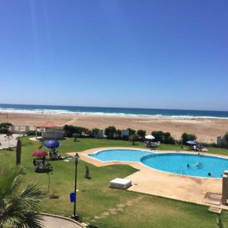 Seaside Poolside Apartment Асила Екстериор снимка